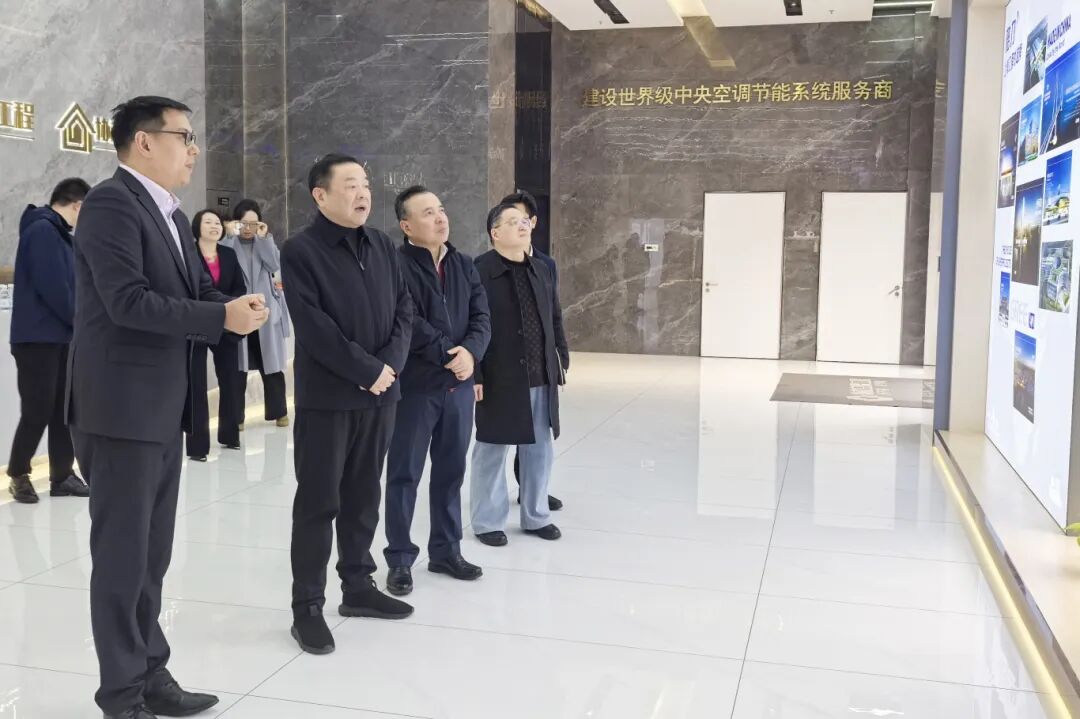 松江区政协主席刘其龙参访上海协格